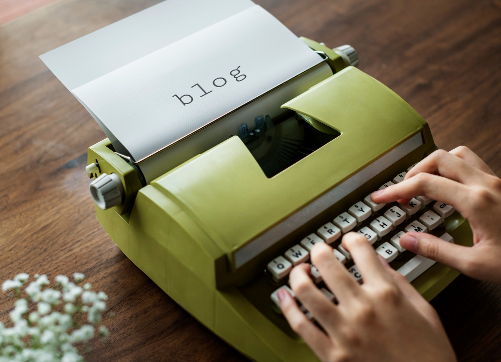 Aerial View of a Man Typing on a Retro Typewriter 