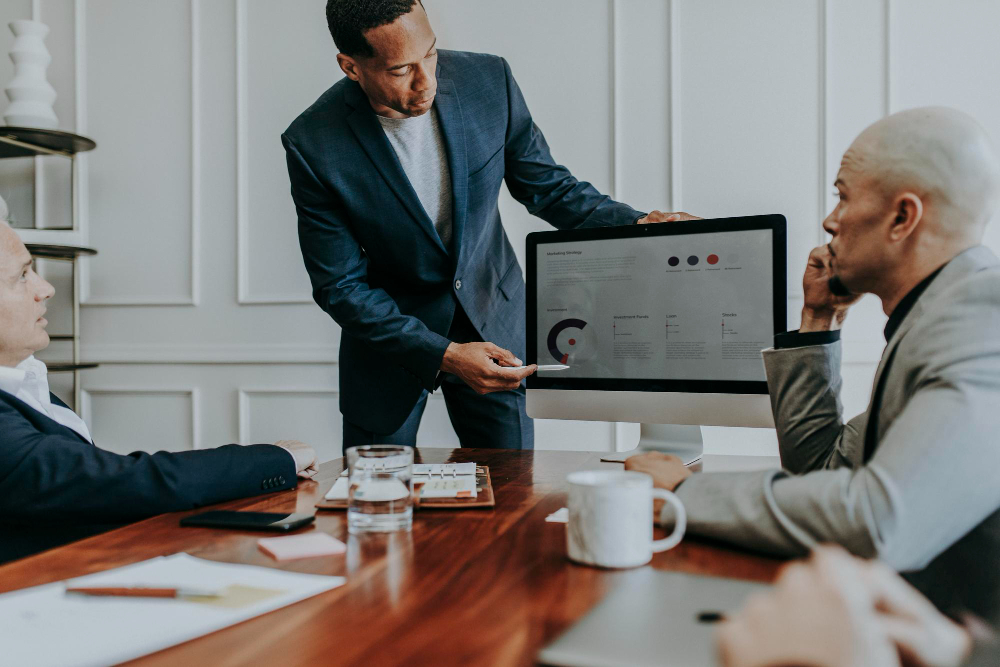 Businessman Explaining the Strategy to His Team