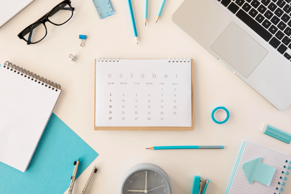 Flat Lay Desk Calendar With Blue Office Accessories