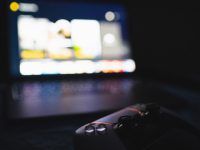 a close up of a video game controller streaming options, movies list, free platforms