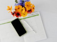 black iphone 5 on white paper iphone control center, do not disturb, silence mode