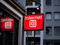 Internet LED signage beside building near buildings reverse image search, online identity, internet tools