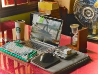 A laptop computer sitting on top of a desk laptop cooling, pc maintenance, gaming laptop setup