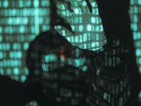 woman in black and white checkered dress hacker, cybersecurity, data breach