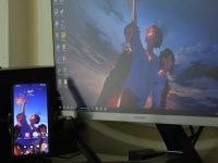 a desktop computer monitor sitting on top of a desk gaming monitor, g sync overlay, smooth gameplay