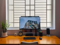 black flat screen computer monitor on brown wooden desk windows task manager, background processes, office pop up