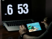 person using macbook pro on brown wooden table gamers, overwatch, error screen
