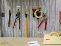 a bunch of tools are on a wall hvac technician, leak detection, refrigerant tools