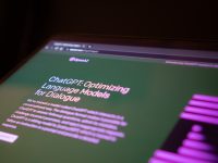 a close up of a computer screen with a blurry background chatbot, user engagement, ai character