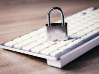 Exploring Twofish Encryption and Its Importance a computer keyboard with a padlock on top of it vpn security, data encryption, digital privacy