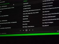 a computer screen with a bunch of music on it windows update screen, system update, checking for updates