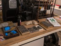 a wooden table topped with lots of different types of items sorting machine,minerals,separation process
