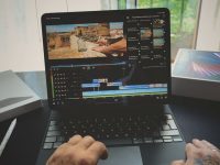 black and silver laptop computer video editing, desktop software, timeline interface