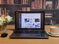 black laptop computer on brown wooden table searching laptop blogger royalty free images