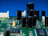 Electronic circuit board with various components. motherboard computer chips tech