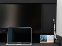 Bottom of screen has a weird glow—causes and fixes A laptop computer sitting on top of a desk display adapter tips, cable connection, home office setup