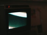 Streaming Devices for Travel: Hotel Wi-Fi Tips black crt tv turned on showing blue screen vhs, tv comparison, screen resolution