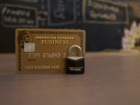 closeup photo of American Express Business card on brown surface crypto wallet, blockchain security, secure transaction