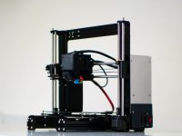 a 3d printer with wires attached to it creality ender 2 pro, small 3D printer, hobby printing