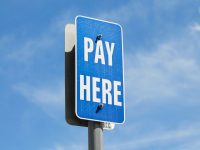 a blue sign with white text payoneer, online payment, alternative to paypal