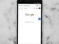 Google Assistant Refusing Offline Commands and the Model Cache Regeneration That Enabled Standalone Processing black Android smartphone showing google site on white surface google assistant, offline mode, ai cache