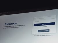 Facebook login screen on a computer monitor. facebook name settings mobile desktop user interface