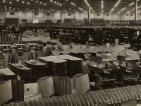 grayscale photo of a library warehouse interior inventory barcode scanner