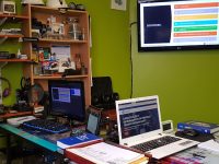 A laptop computer sitting on top of a desk ai assistant dashboard, business productivity tools, real time analytics