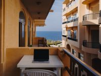 Top 15 Property Management Software Platforms In 2026 Ranked By Features, Pricing, And User Satisfaction macbook pro on white table property management dashboard, rental analytics screen, property software interface