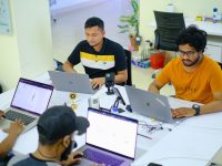 people sitting at the table using laptops modern office startup team working, artificial intelligence company, tech startup workspace