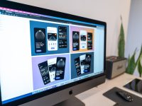 silver imac on white table visual app builder interface, backend dashboard panels, mobile app design screen