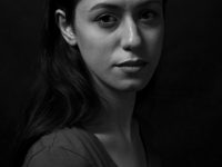 a black and white photo of a woman portrait reference image, studio lighting face photo, neutral background headshot