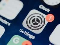 a close up of a cell phone with icons on it iphone reset network settings menu, ios general settings screen, reset options iphone