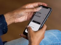 a woman holding a cell phone in her hand cancel subscription screen, mobile app payment settings, online billing management